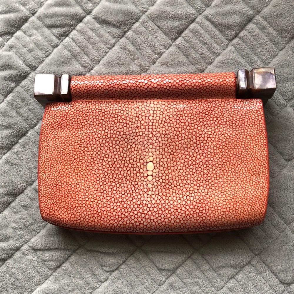 Celestina Stingray leather clutch with mother pearls design